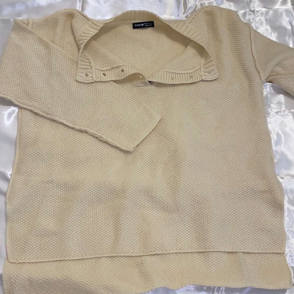 cream sweater